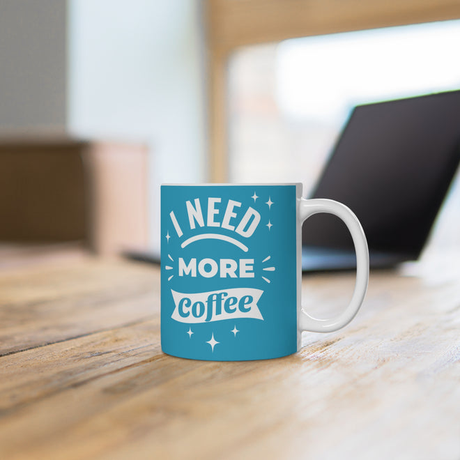 Lustige Spruchtasse – 'I Need More Coffee' Türkis