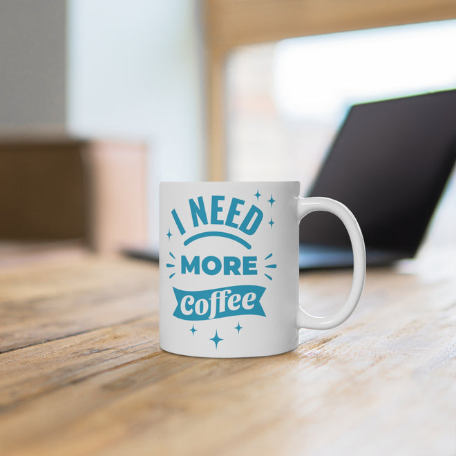 Funny Coffee Mug – 'I Need More Coffee' Türkis-Weiss