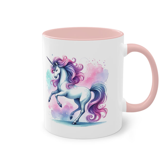 Tasse mit rosa Griff und Rand, verziert mit einer Illustration eines majestätischen Einhorns mit lila und pinker Mähne, auf einem weißen Hintergrund.